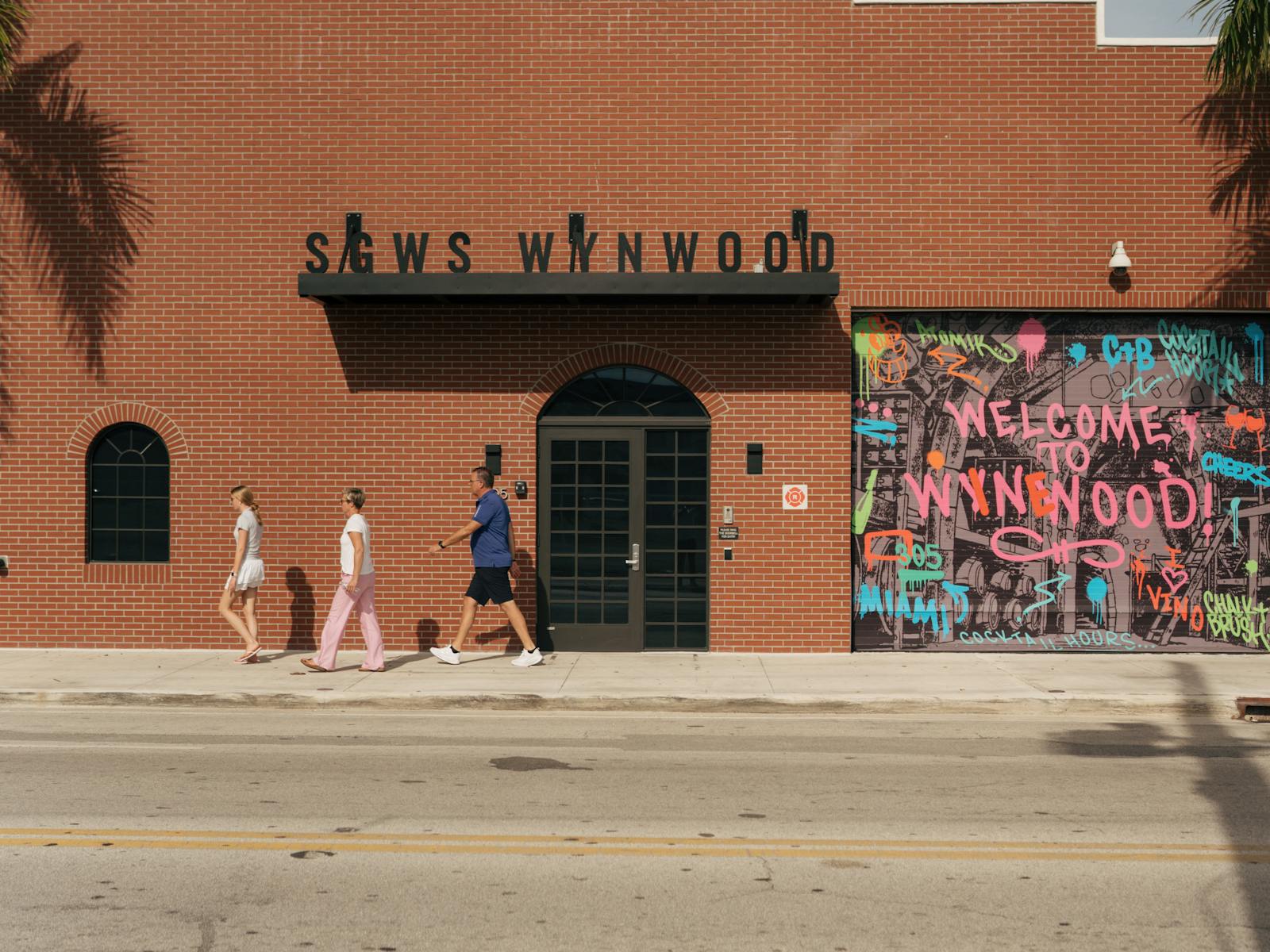 Street art mural and pedestrians in Wynwood, Miami